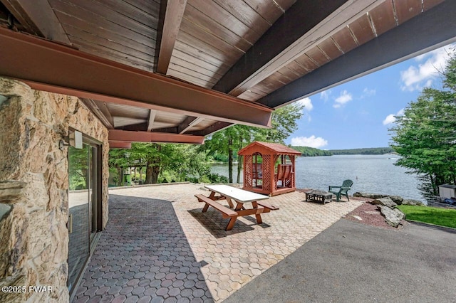 518 Lakeview Dr E, Lake Ariel, PA 18436 - view of patio / terrace featuring a water view and a fire pit