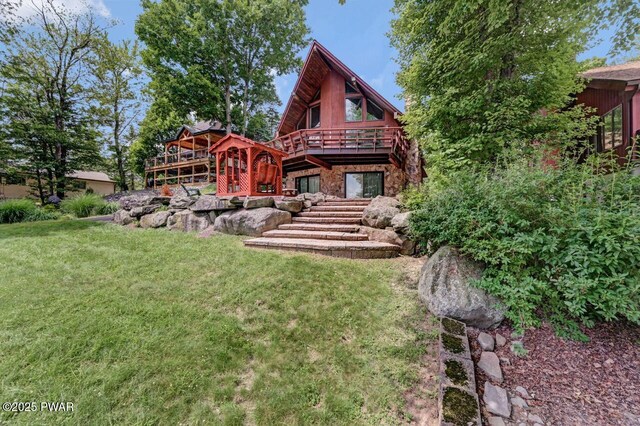 518 Lakeview Dr E, Lake Ariel, PA 18436 - rear view of house featuring a wooden deck and a yard