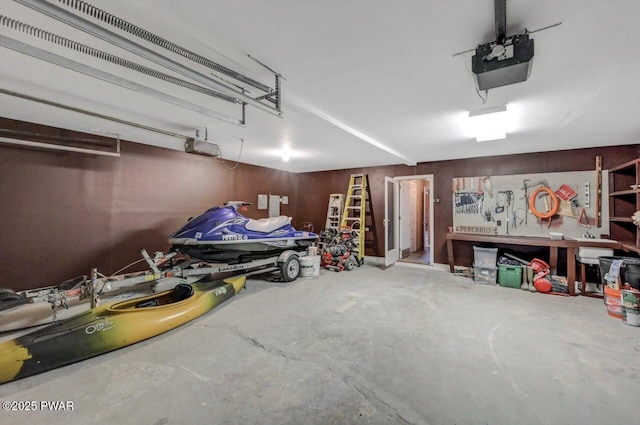 518 Lakeview Dr E, Lake Ariel, PA 18436 - garage featuring a garage door opener