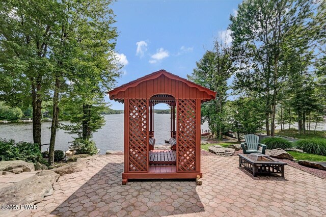 518 Lakeview Dr E, Lake Ariel, PA 18436 - view of patio / terrace with a fire pit and a water view