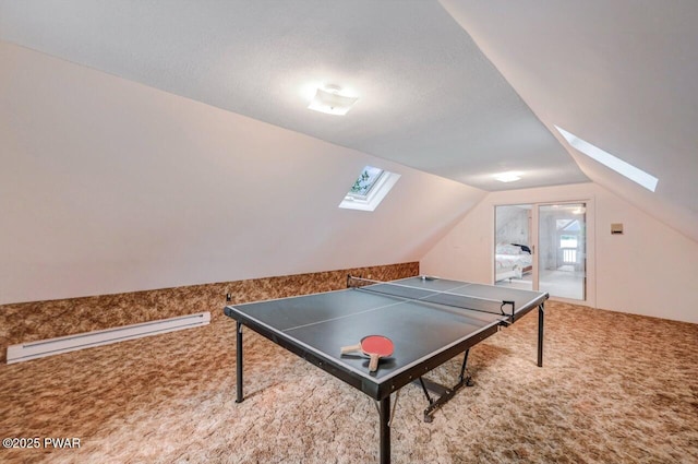 518 Lakeview Dr E, Lake Ariel, PA 18436 - rec room featuring a skylight, carpet flooring, vaulted ceiling, and a baseboard radiator