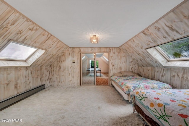 518 Lakeview Dr E, Lake Ariel, PA 18436 - carpeted bedroom featuring a skylight, a baseboard heating unit, lofted ceiling, and wood walls