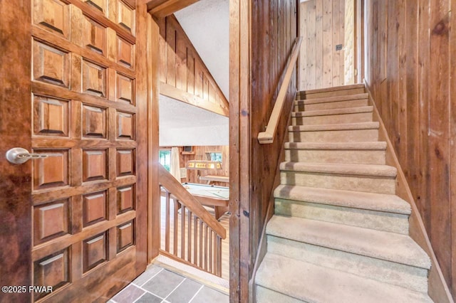 518 Lakeview Dr E, Lake Ariel, PA 18436 - stairway with wood walls and tile patterned floors