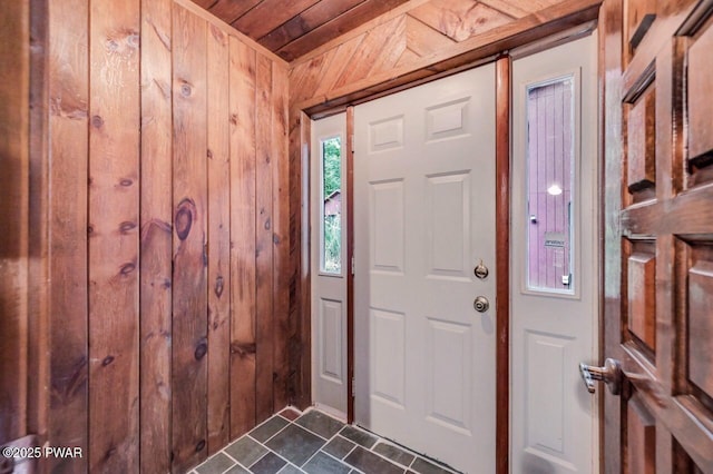 518 Lakeview Dr E, Lake Ariel, PA 18436 - entryway with wooden walls, wood ceiling, and dark tile patterned flooring