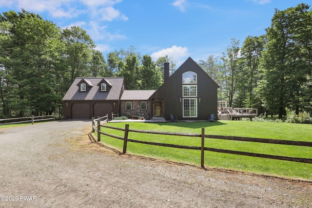 58 Rude Rd, Waymart, PA 18472 - view of front of home featuring driveway, a chimney, a wooden deck, and a garage