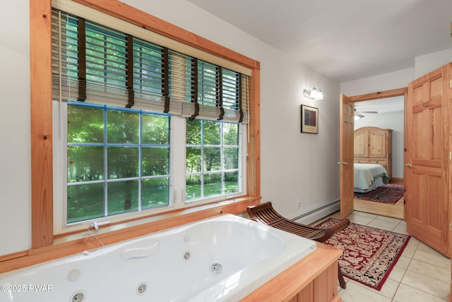 58 Rude Rd, Waymart, PA 18472 - bathroom featuring baseboard heating, healthy amount of natural light, tile patterned floors, and a tub with jets