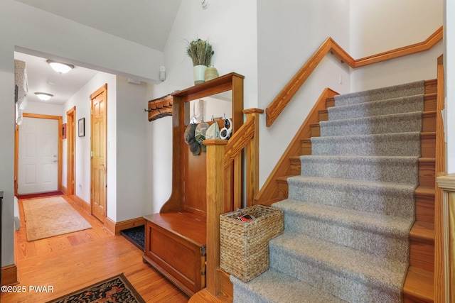 58 Rude Rd, Waymart, PA 18472 - stairs with wood finished floors and vaulted ceiling