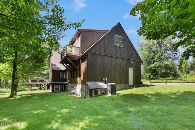 58 Rude Rd, Waymart, PA 18472 - back of house with a wooden deck and stone siding
