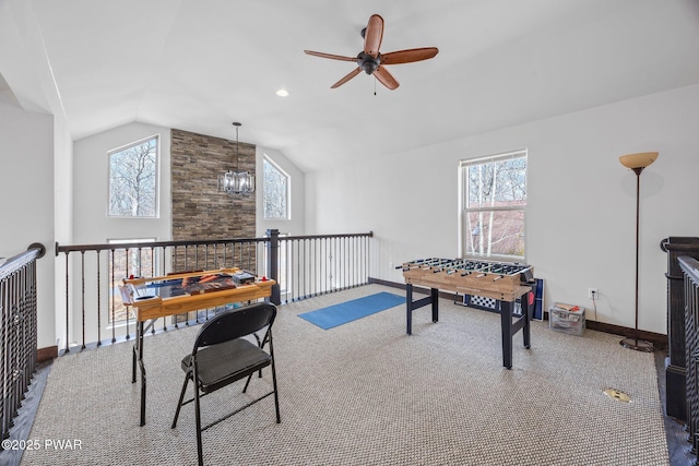 playroom featuring baseboards, ceiling fan, carpet flooring, and lofted ceiling