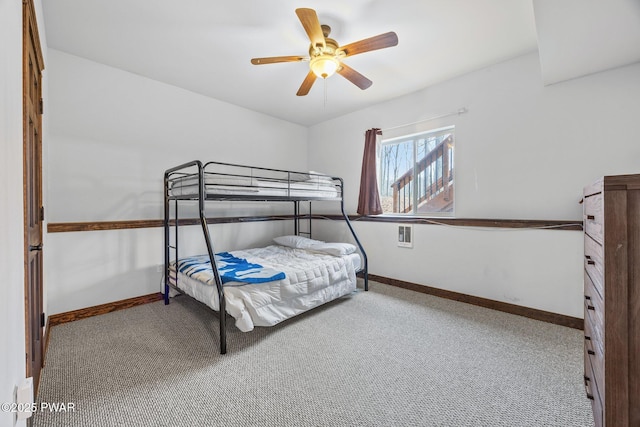 bedroom with carpet flooring, baseboards, and ceiling fan