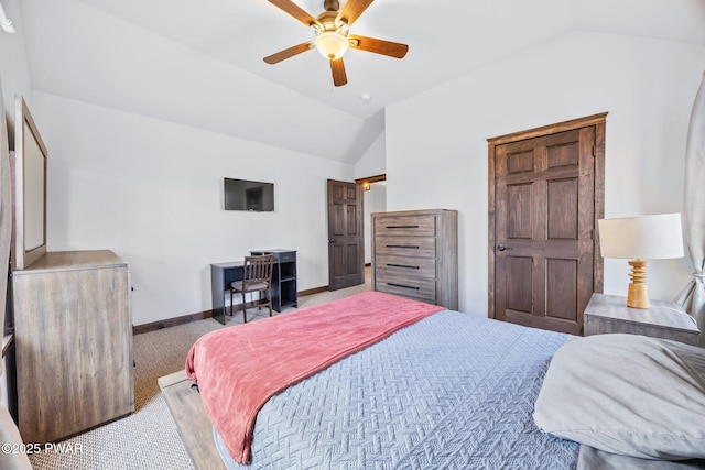bedroom with carpet floors, baseboards, ceiling fan, and lofted ceiling