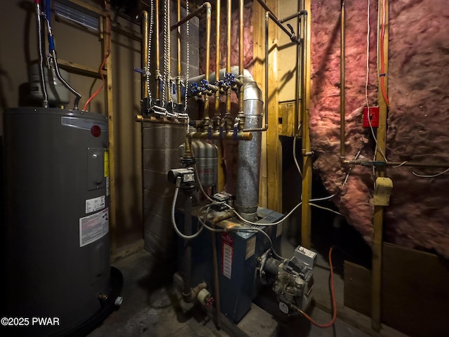 utility room featuring water heater