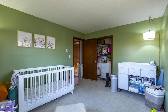 bedroom featuring a closet and carpet floors