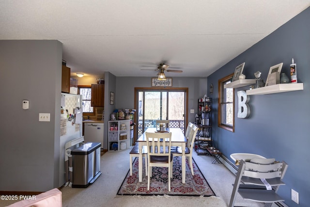 dining area with ceiling fan