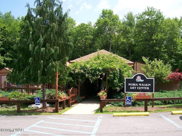 exterior space featuring uncovered parking