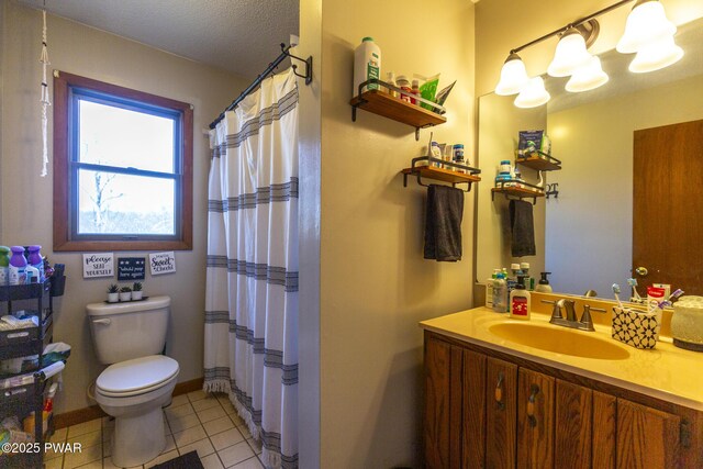 bathroom featuring a notable chandelier, toilet, a textured ceiling, tile patterned flooring, and vanity