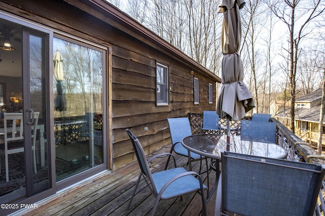 deck with outdoor dining space