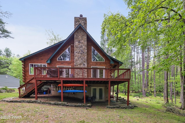 102 Bugle Ct, Lackawaxen, PA 18435 - back of house featuring a chimney, a deck, stairs, log siding, and french doors