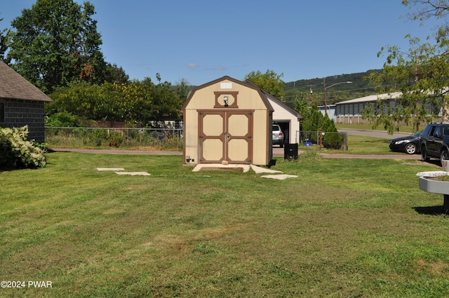 view of outdoor structure featuring a yard