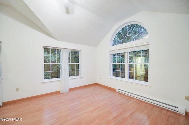 102 Eagle Rock Rd, Lackawaxen, PA 18435 - empty room featuring baseboard heating, vaulted ceiling, plenty of natural light, light wood-type flooring, and ceiling fan