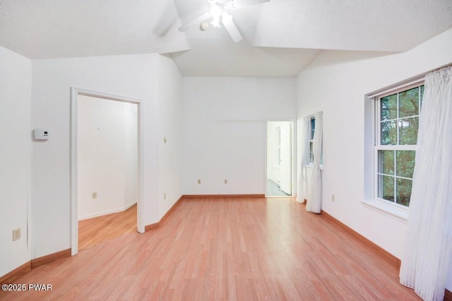 102 Eagle Rock Rd, Lackawaxen, PA 18435 - unfurnished room featuring light wood finished floors, a ceiling fan, and lofted ceiling