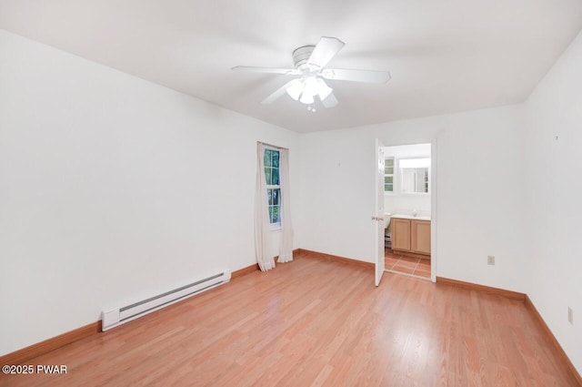 102 Eagle Rock Rd, Lackawaxen, PA 18435 - unfurnished room featuring a baseboard heating unit, light wood-style floors, and ceiling fan