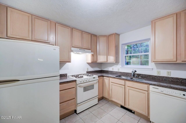 102 Eagle Rock Rd, Lackawaxen, PA 18435 - kitchen with white appliances, light brown cabinetry, under cabinet range hood, and a textured ceiling
