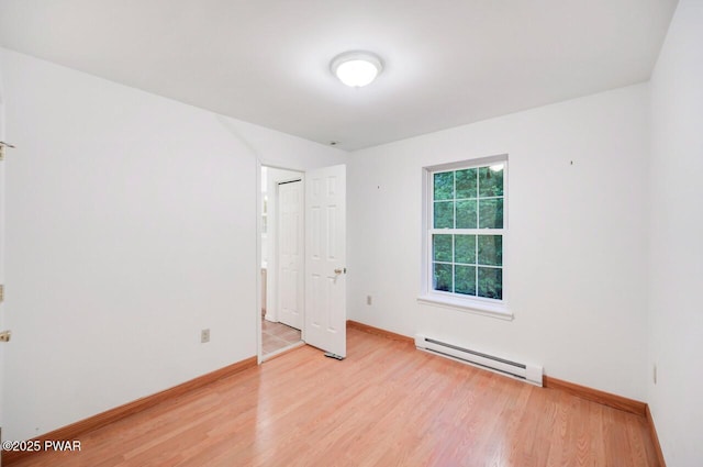102 Eagle Rock Rd, Lackawaxen, PA 18435 - unfurnished room with baseboard heating and light wood-type flooring