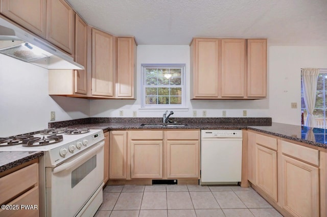 102 Eagle Rock Rd, Lackawaxen, PA 18435 - kitchen with white appliances, under cabinet range hood, light brown cabinetry, a textured ceiling, and light tile patterned floors