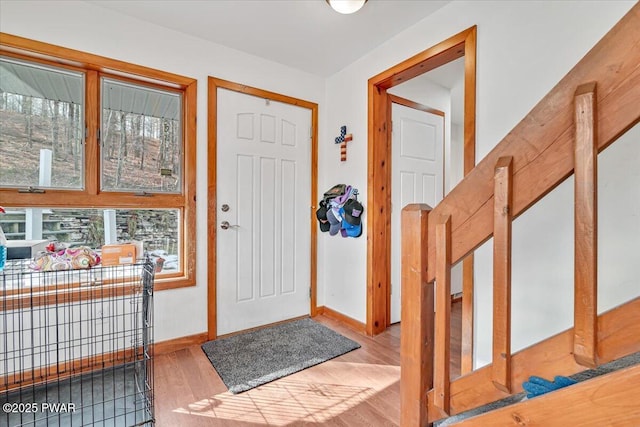 entrance foyer with light hardwood / wood-style flooring