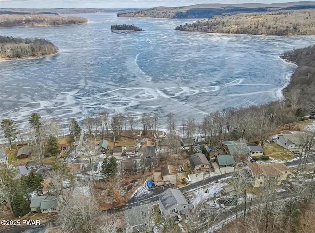 bird's eye view with a water view