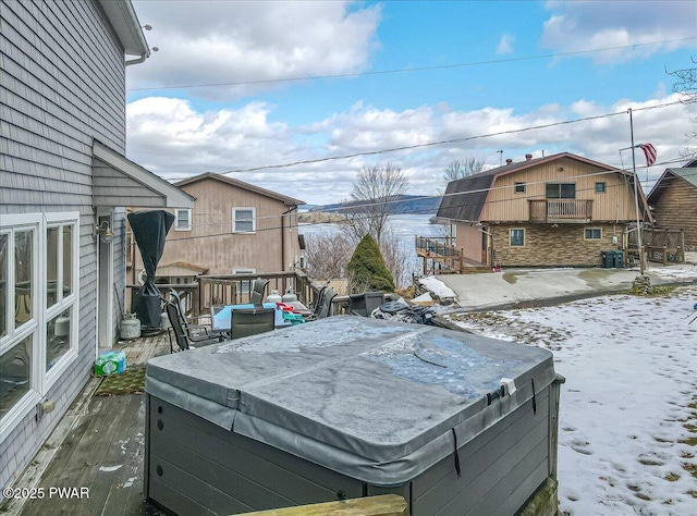 exterior space with a hot tub