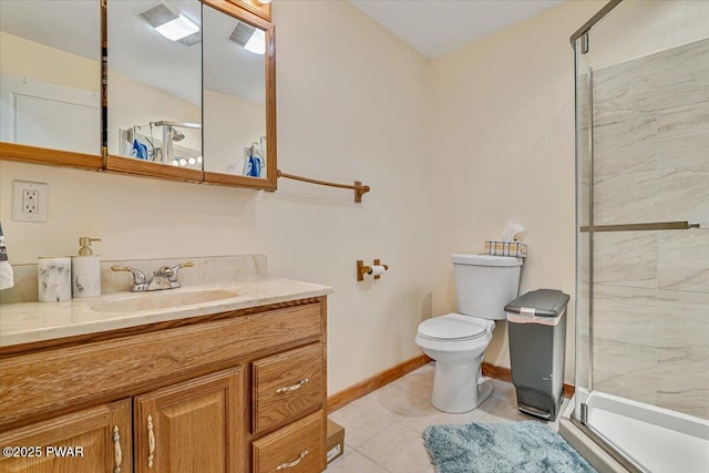 bathroom featuring tile patterned floors, vanity, toilet, and an enclosed shower