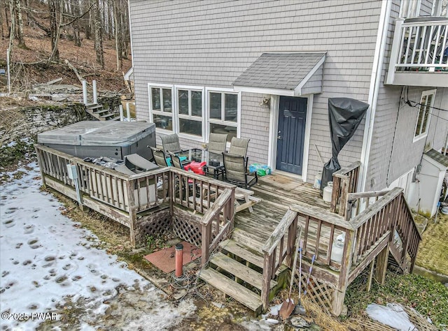 view of snow covered deck