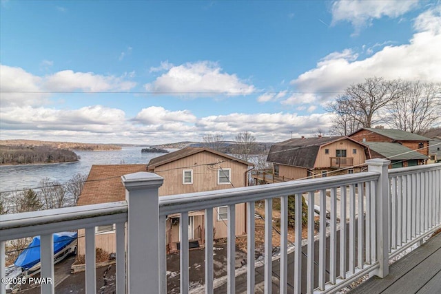 deck featuring a water view