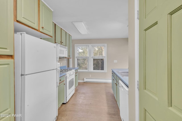 kitchen with light hardwood / wood-style floors, white appliances, sink, and a baseboard heating unit