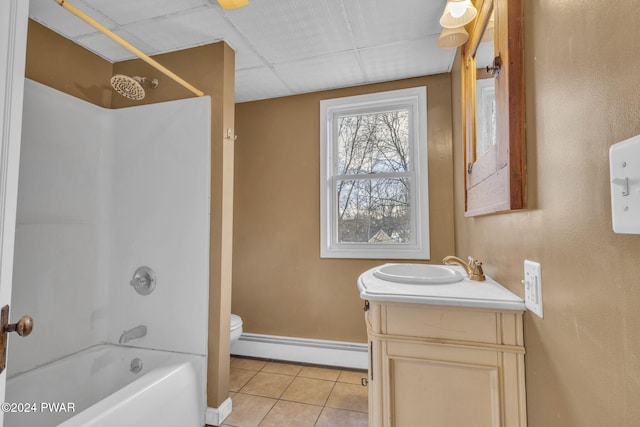 full bathroom with a baseboard radiator, tile patterned flooring, toilet, vanity, and bathtub / shower combination