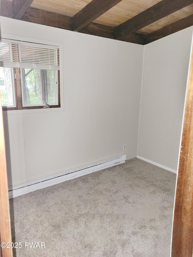 803 Lariat Ct, Hawley, PA 18428 - carpeted spare room featuring a baseboard heating unit and wood ceiling with exposed beams
