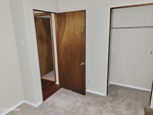 803 Lariat Ct, Hawley, PA 18428 - unfurnished bedroom with carpet, baseboards, and a closet