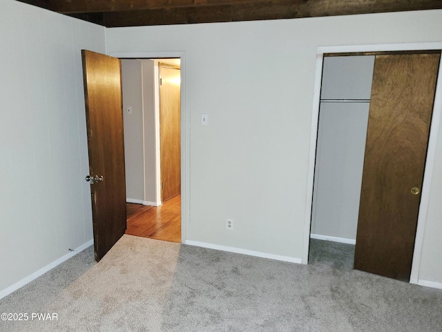 803 Lariat Ct, Hawley, PA 18428 - unfurnished bedroom featuring carpet flooring, baseboards, and a closet