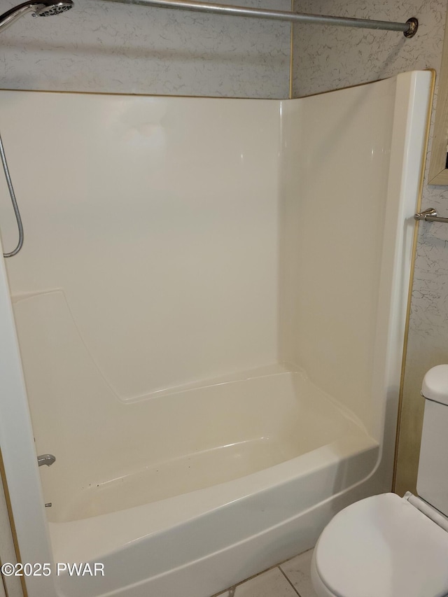 803 Lariat Ct, Hawley, PA 18428 - full bathroom featuring toilet, shower / bath combination, and tile patterned flooring