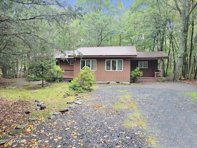 803 Lariat Ct, Hawley, PA 18428 - view of front of property featuring covered porch, crawl space, and a shingled roof