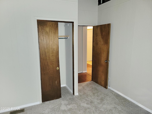 803 Lariat Ct, Hawley, PA 18428 - unfurnished bedroom featuring carpet, baseboards, and a closet