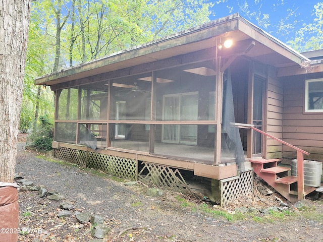 803 Lariat Ct, Hawley, PA 18428 - view of property exterior featuring central AC and a sunroom