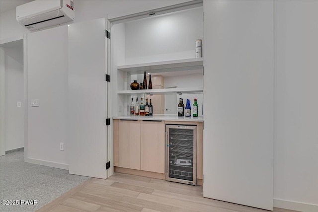 517 Maple Ridge Dr, Lords Valley, PA 18428 - indoor dry bar featuring wine cooler, a wall unit AC, light wood finished floors, and baseboards