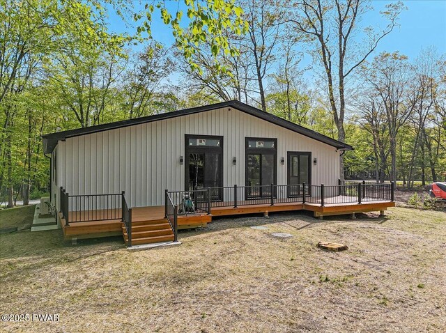 517 Maple Ridge Dr, Lords Valley, PA 18428 - view of front of house featuring a deck and board and batten siding