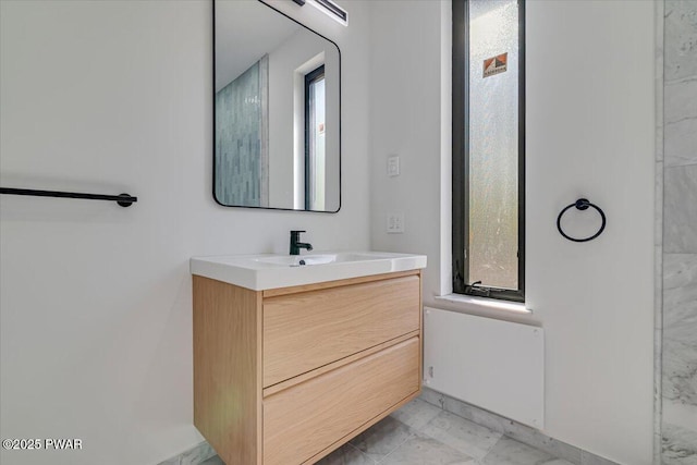 517 Maple Ridge Dr, Lords Valley, PA 18428 - bathroom with vanity and marble look tiles