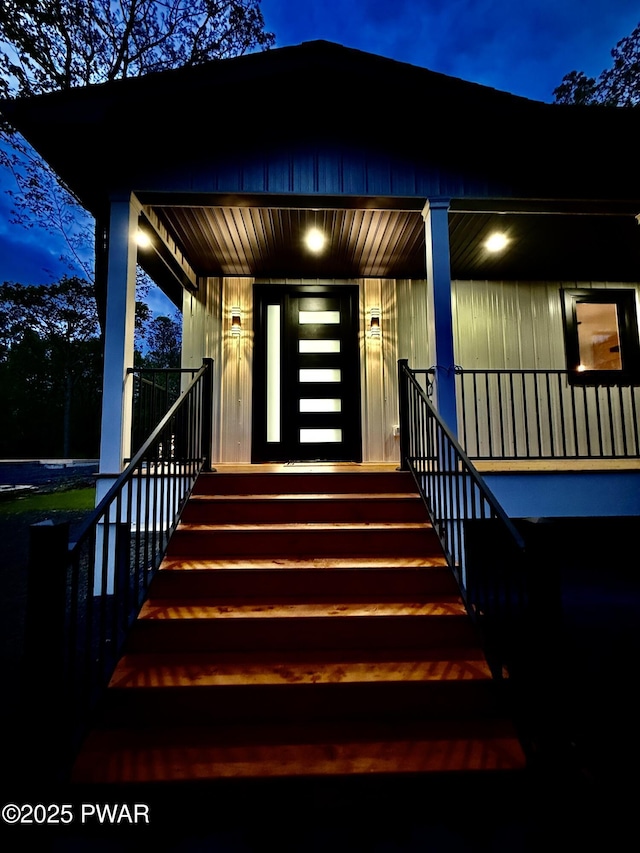 517 Maple Ridge Dr, Lords Valley, PA 18428 - view of exterior entry featuring a porch