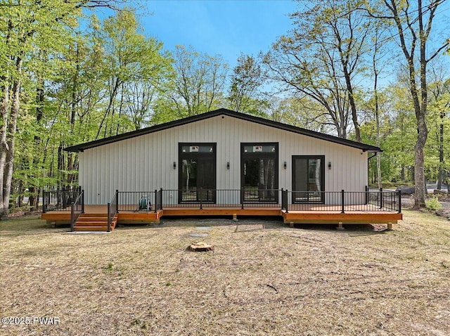 517 Maple Ridge Dr, Lords Valley, PA 18428 - back of property with a wooden deck