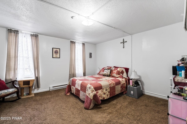 carpeted bedroom featuring multiple windows, a textured ceiling, and a baseboard heating unit